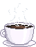 a white coffee cup with steam rising out of it